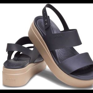 Crocs Brooklyn low wedge sandal size 11 in black with beige base.